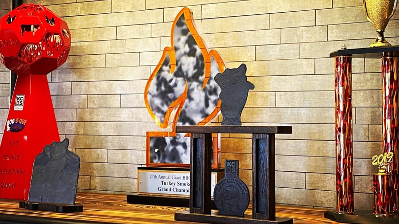 shelf displaying Smokecraft trophies