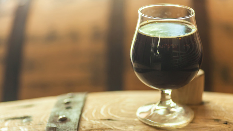 dark beer on barrel