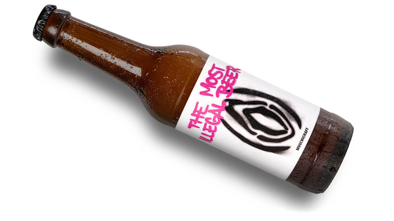 a brown bottle of beer with "The most illegal beer" label
