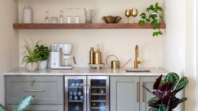 Wet bar with a beverage center under the counter