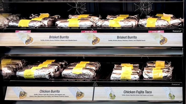 Foil-wrapped burritos on display inside Buc-ee's gas station