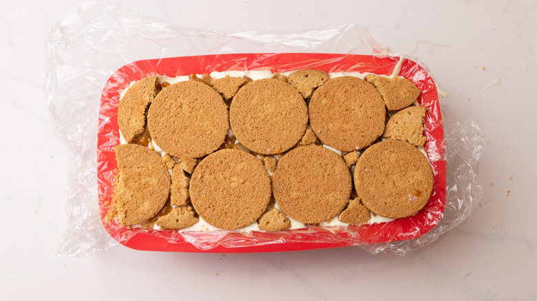 assembled icebox cake with biscuits on top