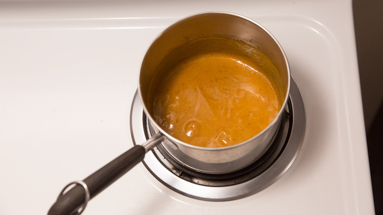 BBQ sauce simmering on stove