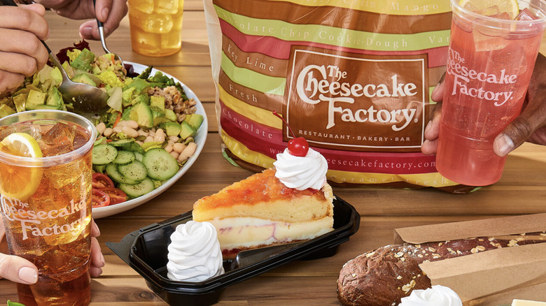 The Cheesecake Factory drinks and food with carryout bag