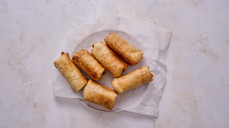 fried chimichangas on a plate
