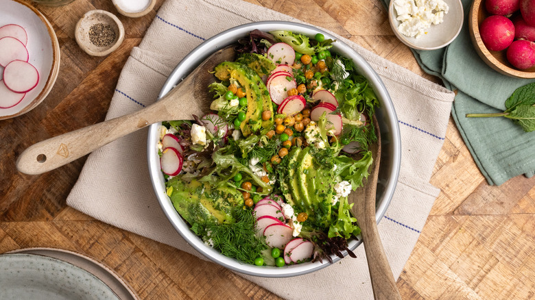 Colorful spring salad in bowl