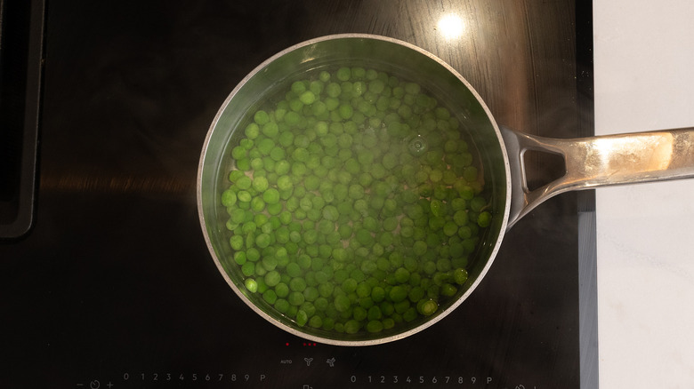 green peas in saucepan