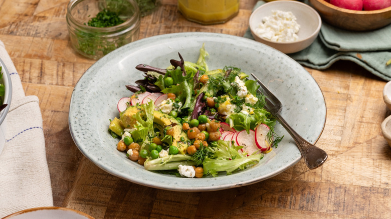 Colorful spring chickpea salad in bowl