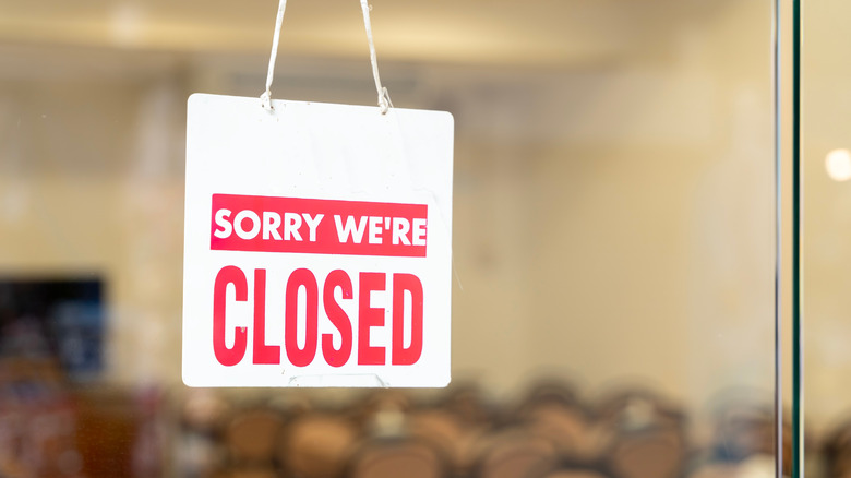 Closed sign in a window