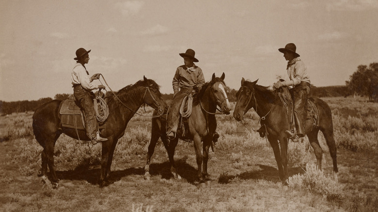 Old picture of cowboys on horses
