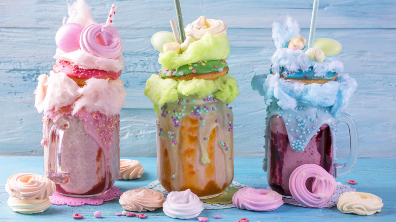 Fully-loaded unicorn milkshakes with candy floss
