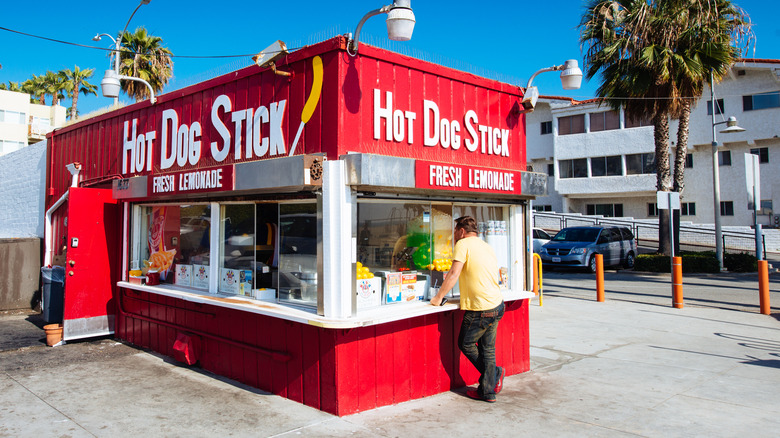 Man ordering at Hot Dog on a Stick