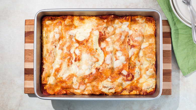 lasagna served on cutting board