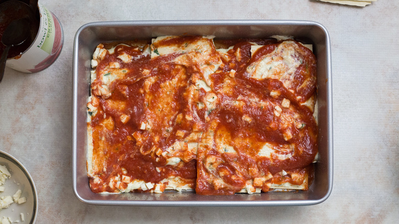 partially made lasagna in pan