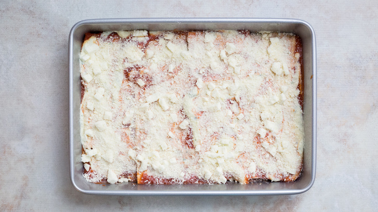unbaked lasagna in pan