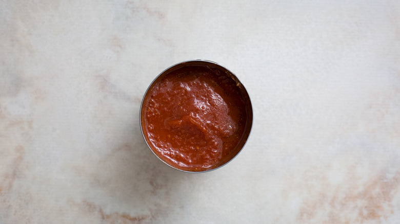 canned tomato puree on table