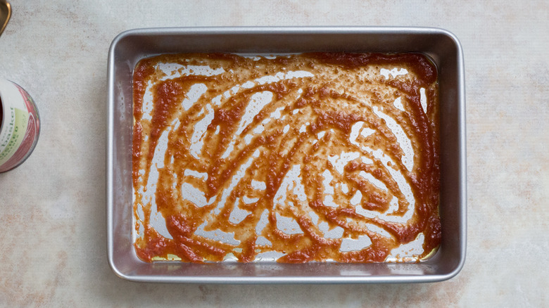 tomato puree in baking dish