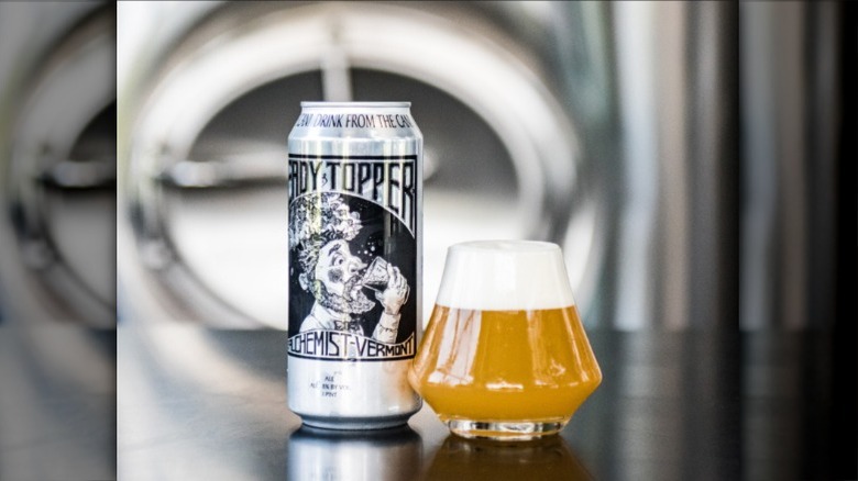 Heady Topper beer can with beer in glass