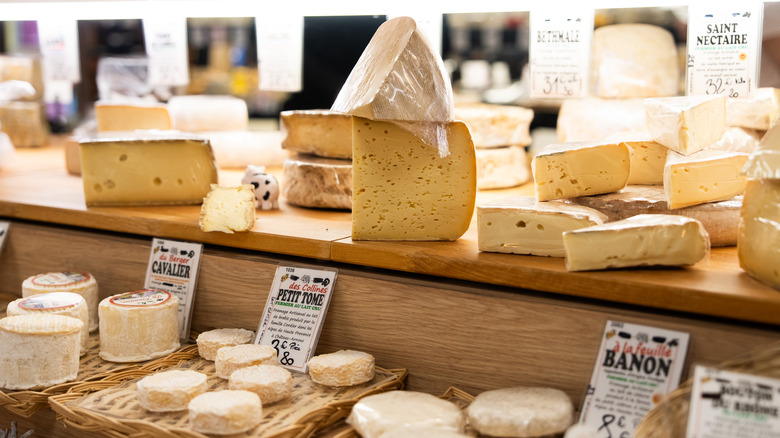 A collection of French cheeses on display