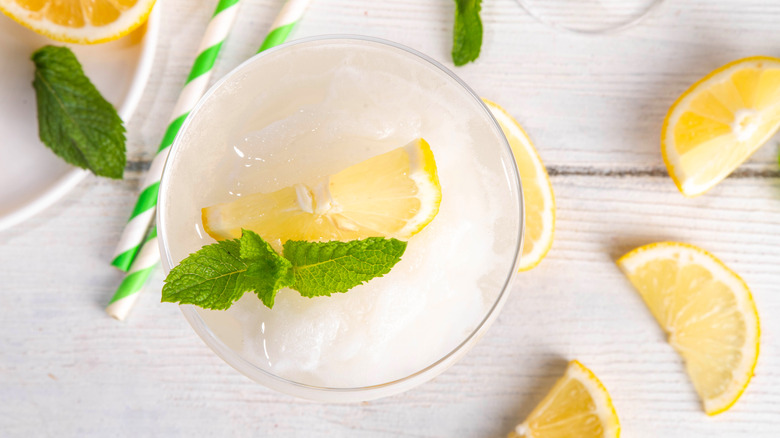 overhead shot of a frozen slushy lemon cocktai in a coupe glass