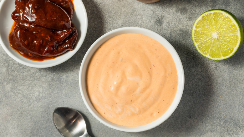 A chipotle small bowl of creamy chipotle sauce