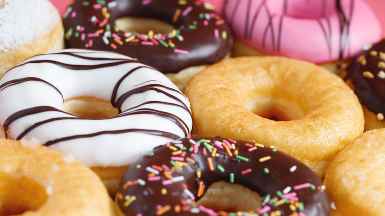 Assorted donuts with colorful glazes and sprinkles