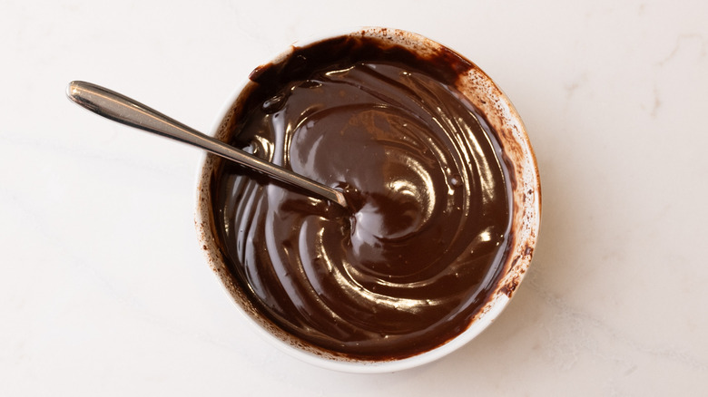 Chocolate ganache mixture in bowl