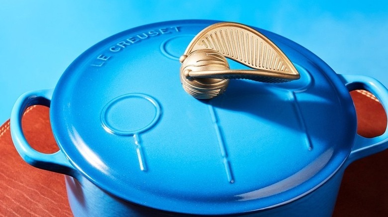 Le Creuset with Harry Potter themed golden snitch as knob