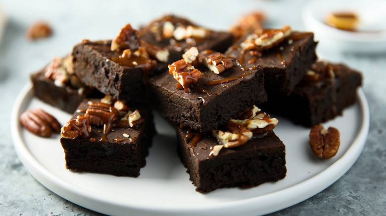 batch of brownies topped with pecans