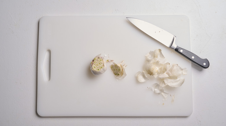 Top sliced off of head of garlic