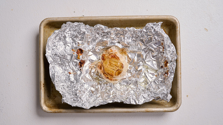 roasted garlic on a sheet tray