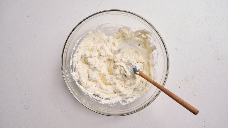 combining dip ingredients in a bowl