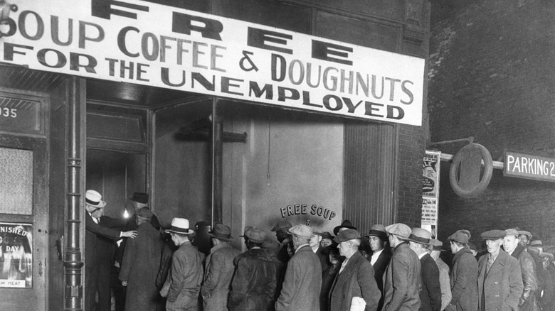Men line up for free soup, coffee, and doughnuts during Great Depression.