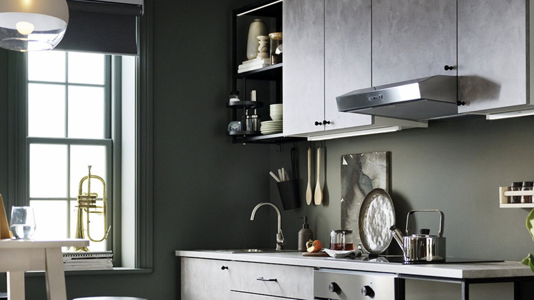 Closeup of stylish kitchen with ENHET Ikea open cabinet