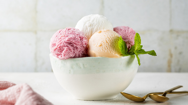 a bowl with scoops of sherbet