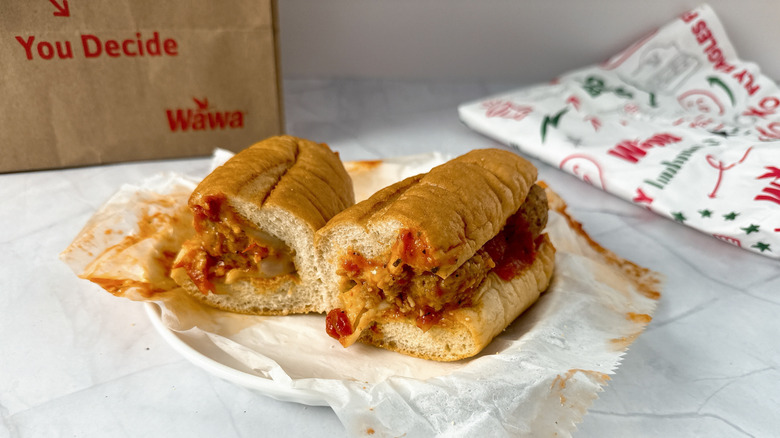 Wawa Meatball sub on toasted wheat on a plate