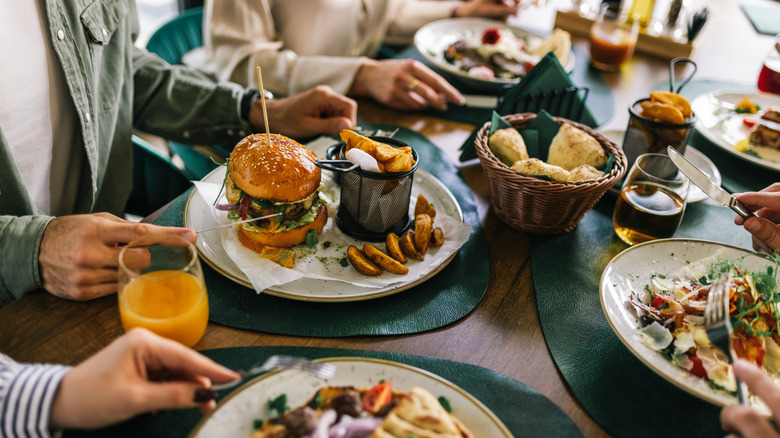 Up-close table spread of restaurant diners