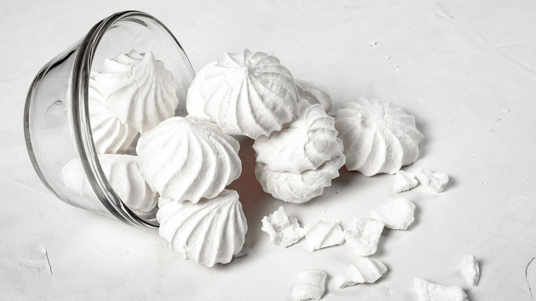 Bowl of meringues splayed on a counter