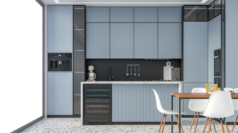 blue gray kitchen cabinets in modern kitchen