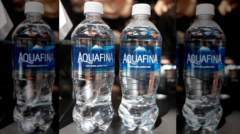 Two bottles of Aquafina water