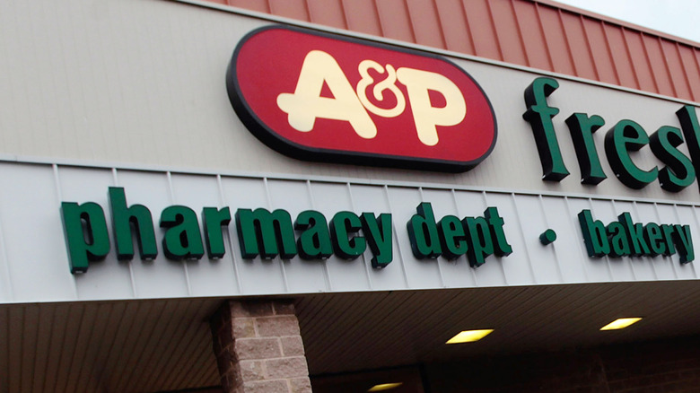 Exterior of A&P grocery store with logo signage