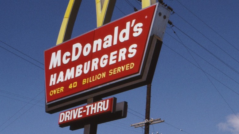The iconic golden arches sign in L.A. in 1983 with the number of orders served