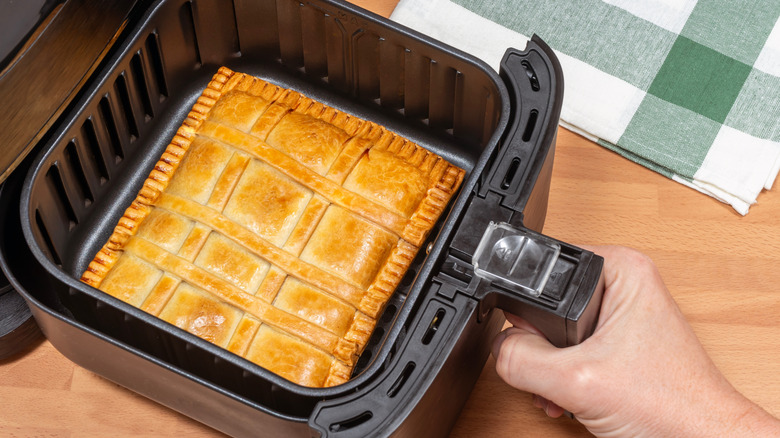 overhead view of square pie in air fryer