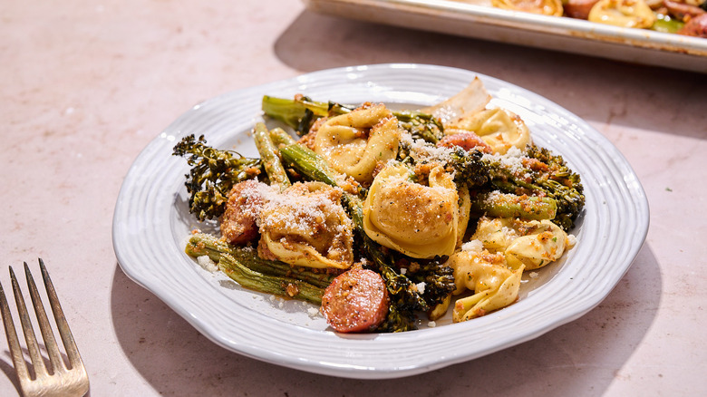 italian sausage and tortellini on a plate