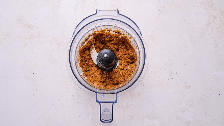 red pesto pulsed with cheese in food processor