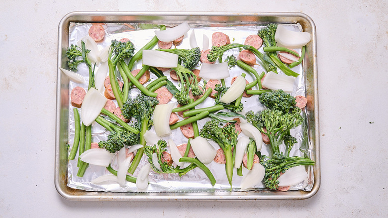 sausage and vegetables on a sheet pan