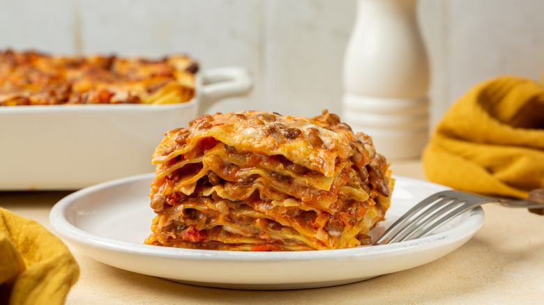 homemade lasagna on a white plate