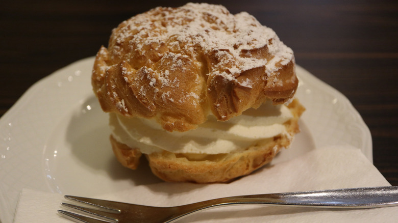 cream puff with cream in the middle