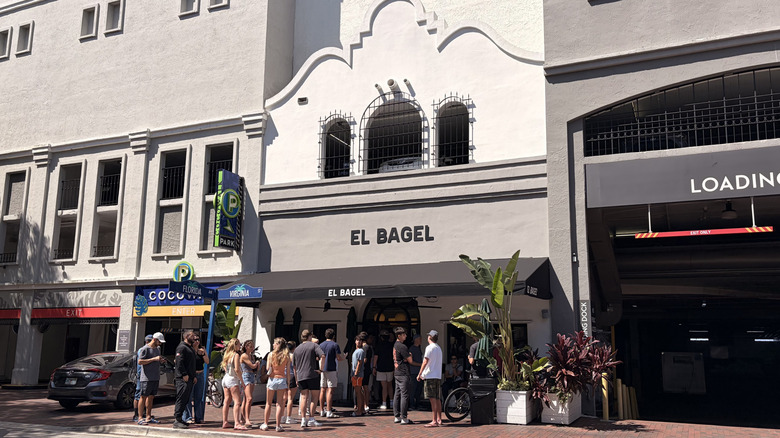 People outside of El Bagel in Miami's Coconut Grove neighborhood