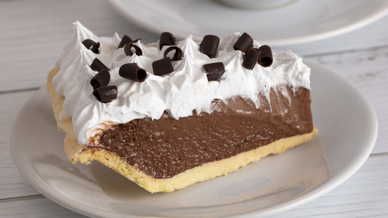 French silk chocolate pie slice on plate